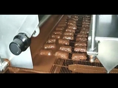 abbigliatore puro del cioccolato di larghezza di 1200mm con due pompe ed il tunnel di raffreddamento